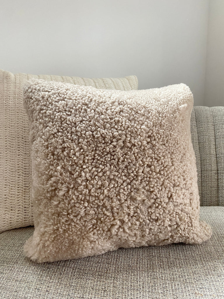 Tan shearling sheepskin pillow