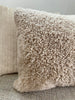 Close-up of tan shearling sheepskin pillow