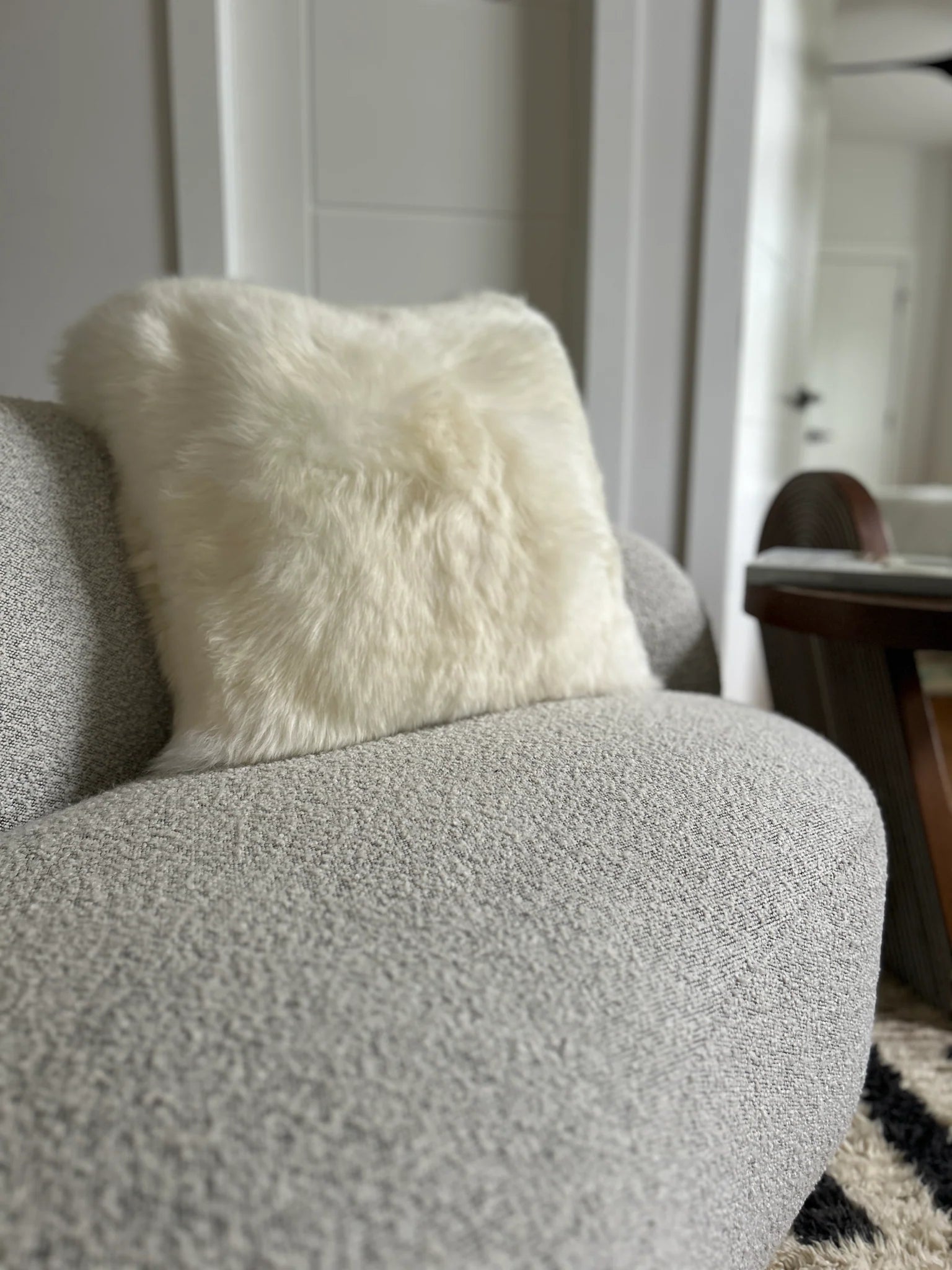 Side view of double sided ivory sheepskin pillowcase