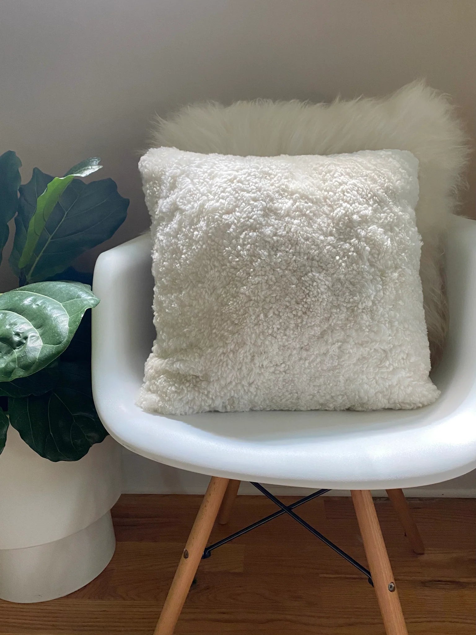 Front-view of ivory shearling sheepskin pillow