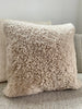 Close-up of ivory shearling sheepskin pillow