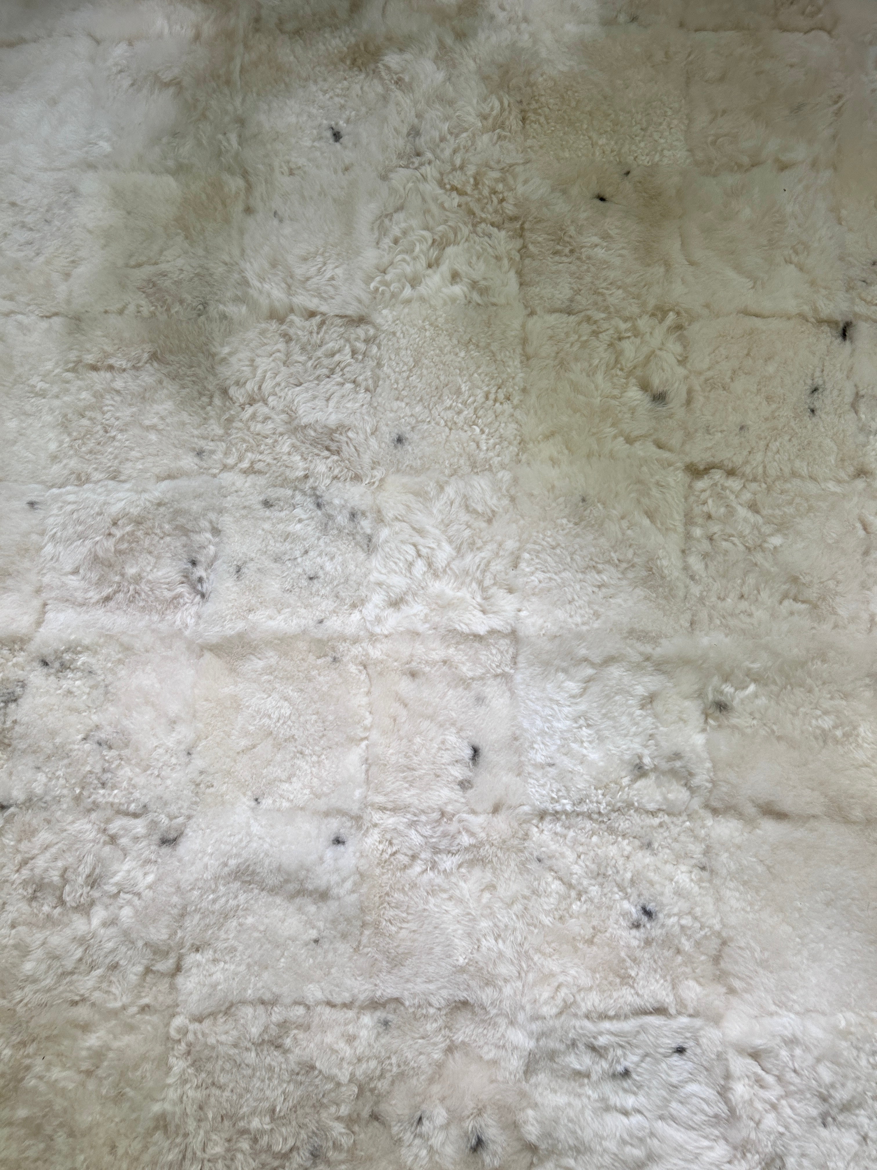Quilt Spotted Ivory Shorn Sheepskin Area Rug