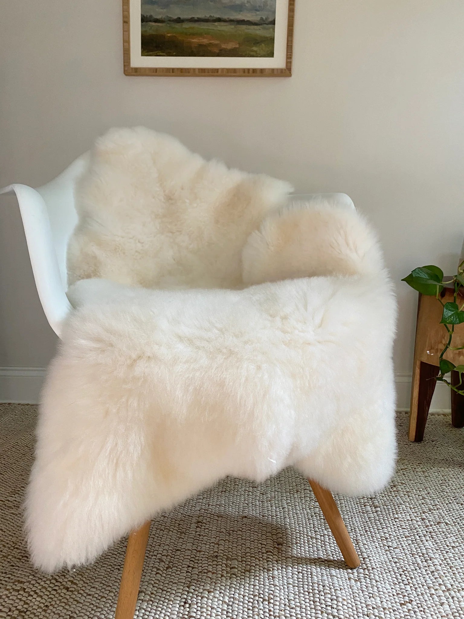Bright ivory nursery sheepskin on a chair