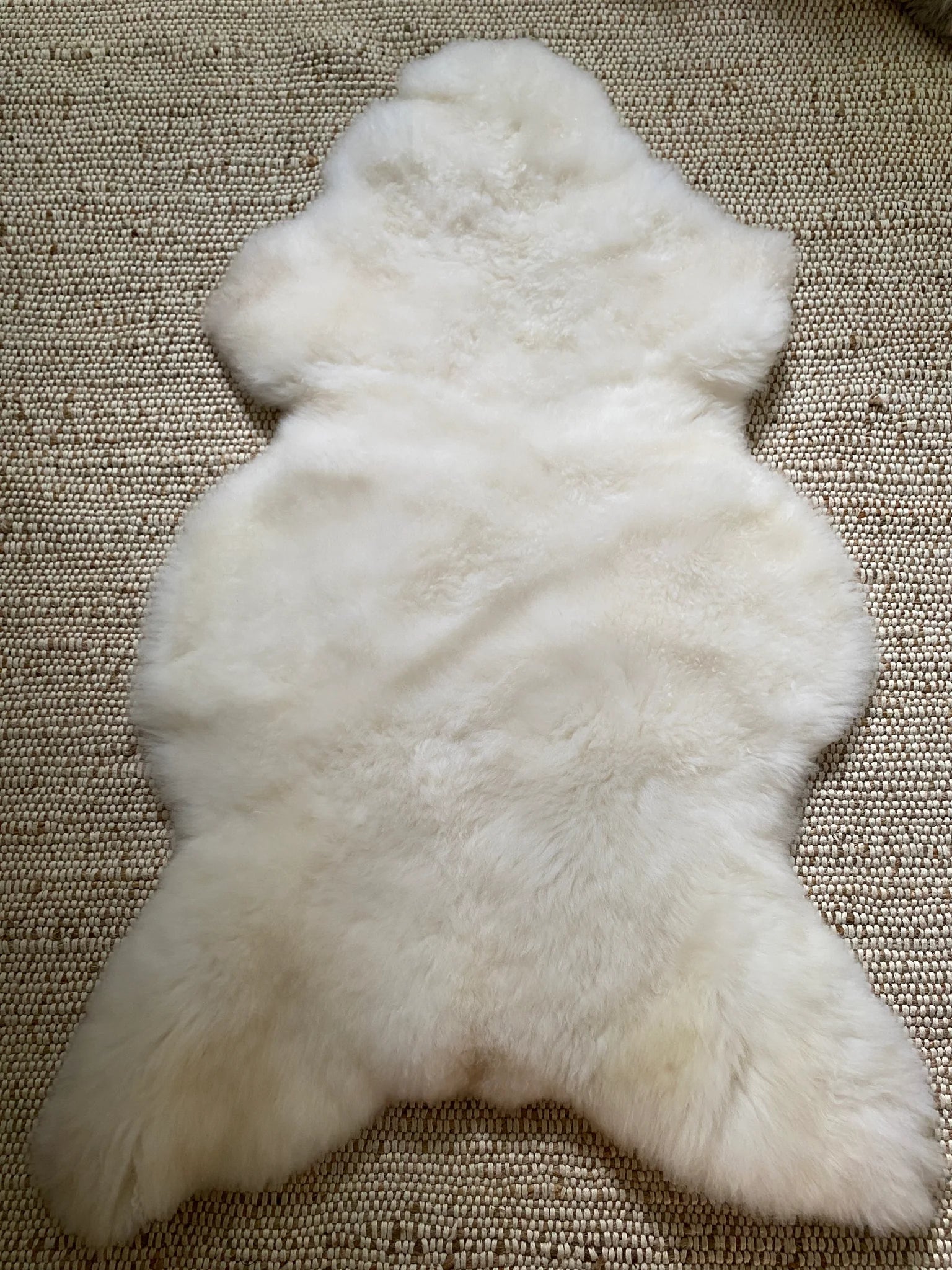 Bright ivory nursery sheepskin