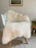 Classic ivory sheepskin on a chair
