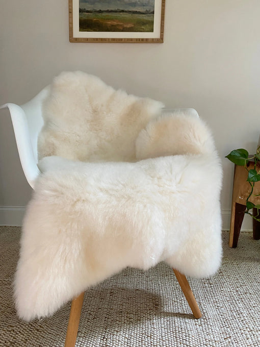 Classic ivory sheepskin on a chair