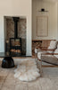 Double sheepskin in white in modern living room 