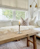 Cozy living room withdouble sheepskin in white