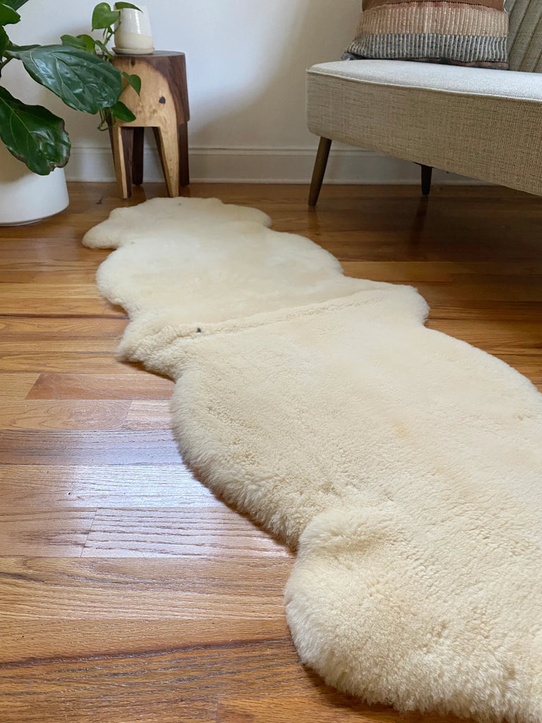 Side-view of double shorn ivory sheepskin