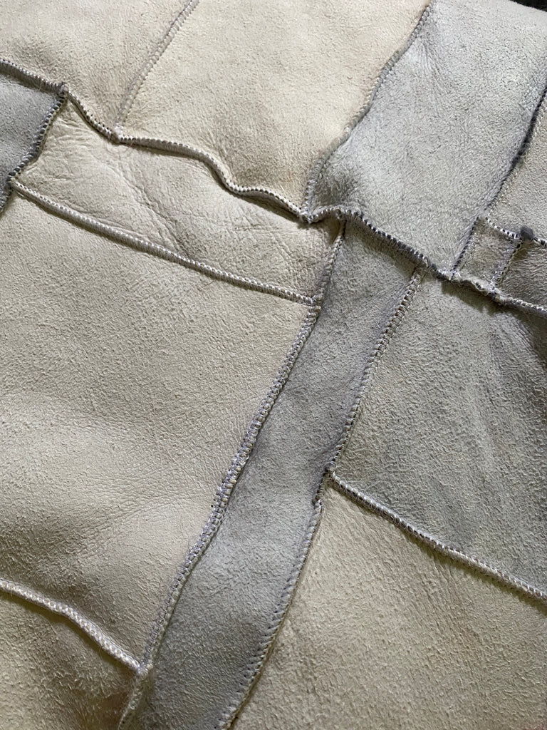 Under texture of icelandic patchwork sheepskin 