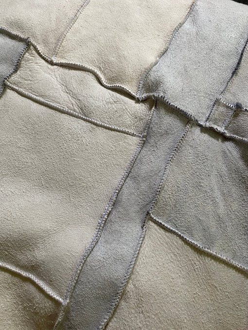 Under texture of icelandic patchwork sheepskin 