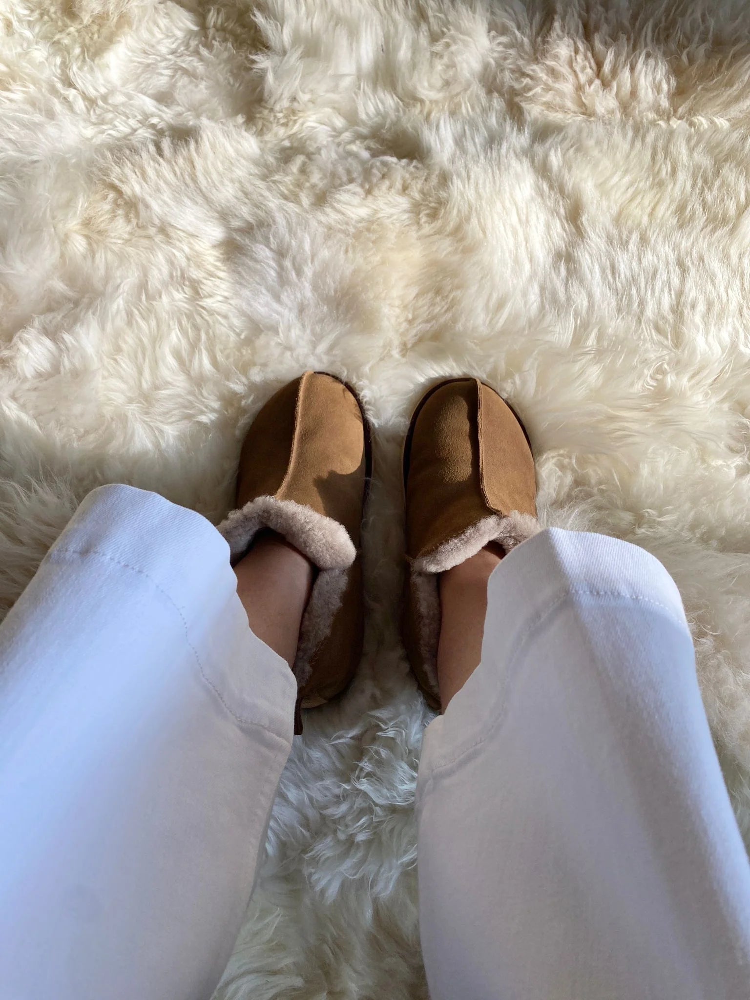 Brown slippers with fur trim 