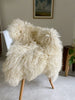 longhaired ivory gotland over chair 