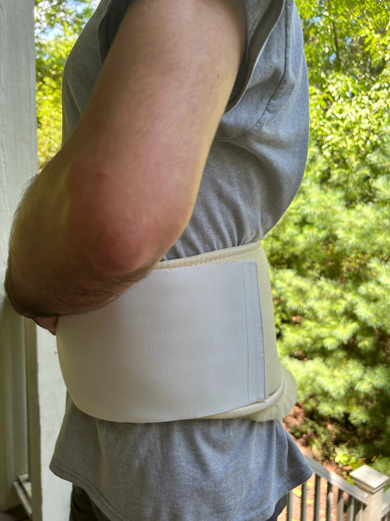 Person wearing a medical grade sheepskin kidney warmer and waist belt