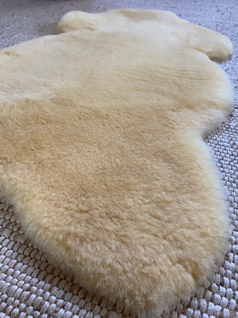 Close-up of medical relugan nursery sheepskin fabric with a soft texture