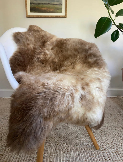 mixed color super soft sheepskin over a chair 