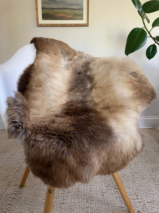 mixed color super soft sheepskin over a chair 