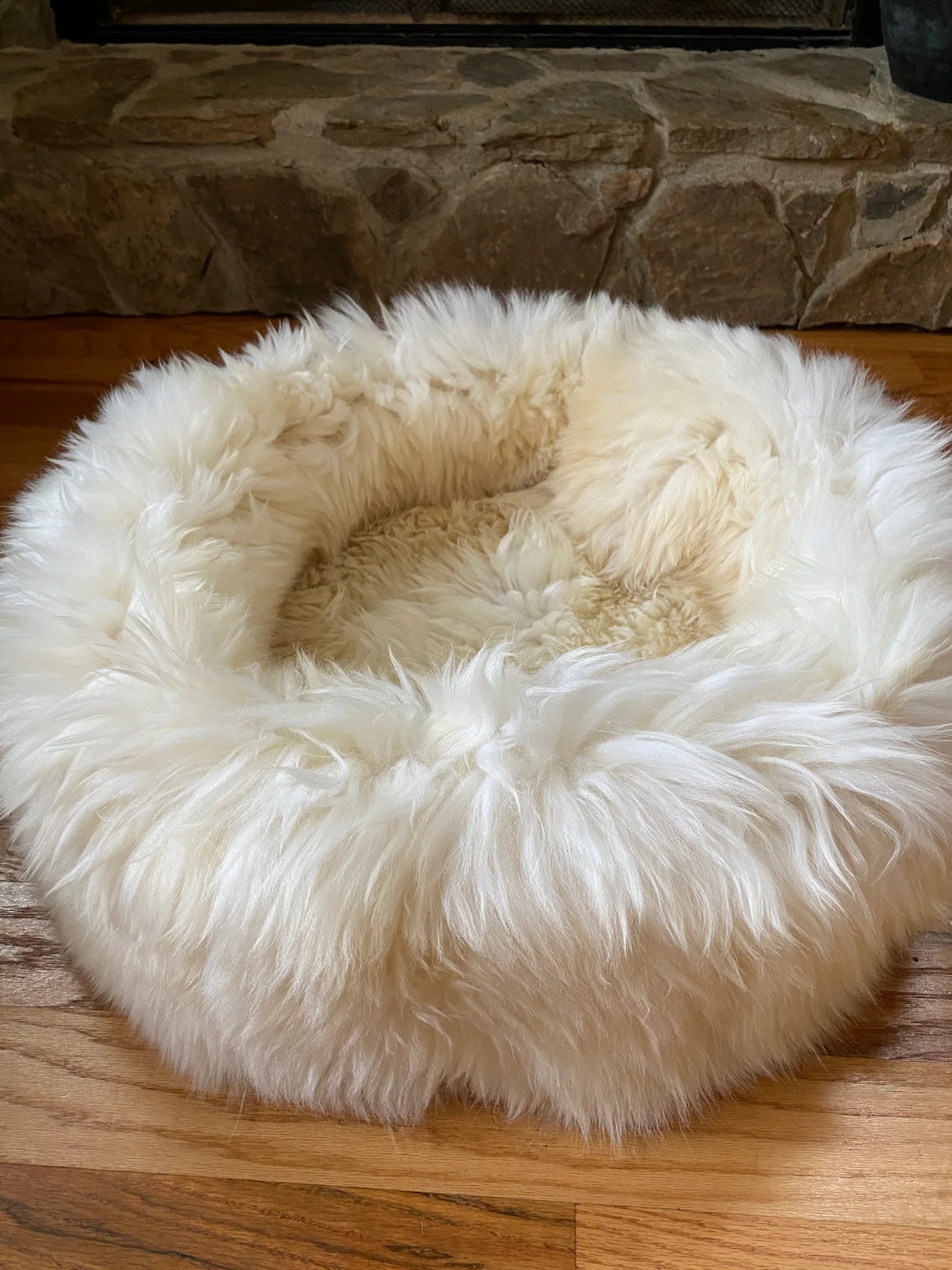 Side-view of plush ivory animal snug