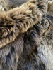 Close-up of plush rich brown sheepskin quad