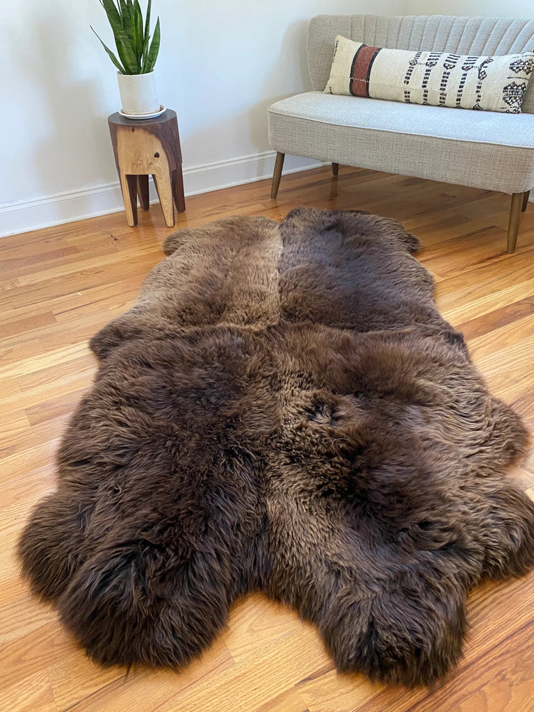 Side-view of plush rich brown sheepskin quad