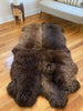 Side-view of plush rich brown sheepskin quad