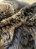 Close-up of plush rich brown sheepskin quad
