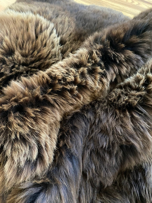 Close-up of plush rich brown sheepskin quad