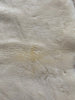Close-up of soft plush texture of ivory sheepskin rug