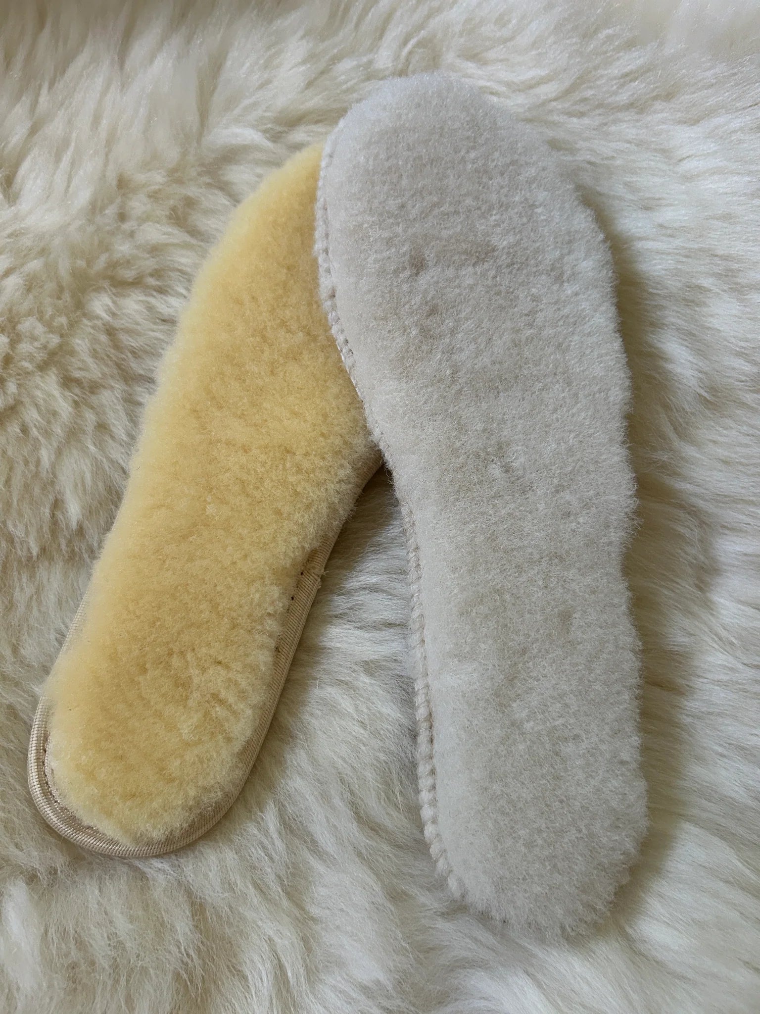 Two pairs of sheepskin insoles