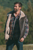 Man wearing a leather sheepskin mens vest outdoors