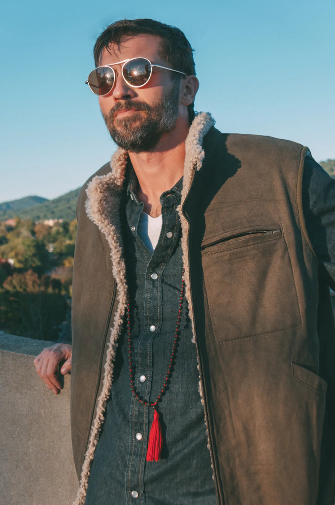 Man wearing sunglasses sheepskin mens vest