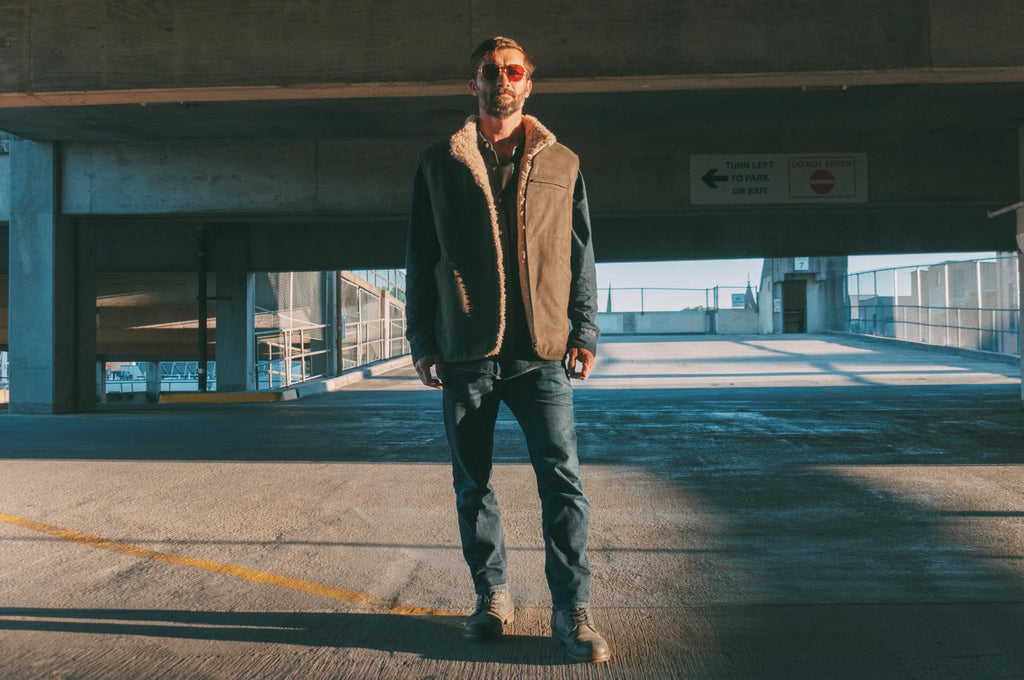 Man standing in a sheepskin mens vest