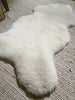 Side-view of short fur ivory sheepskin