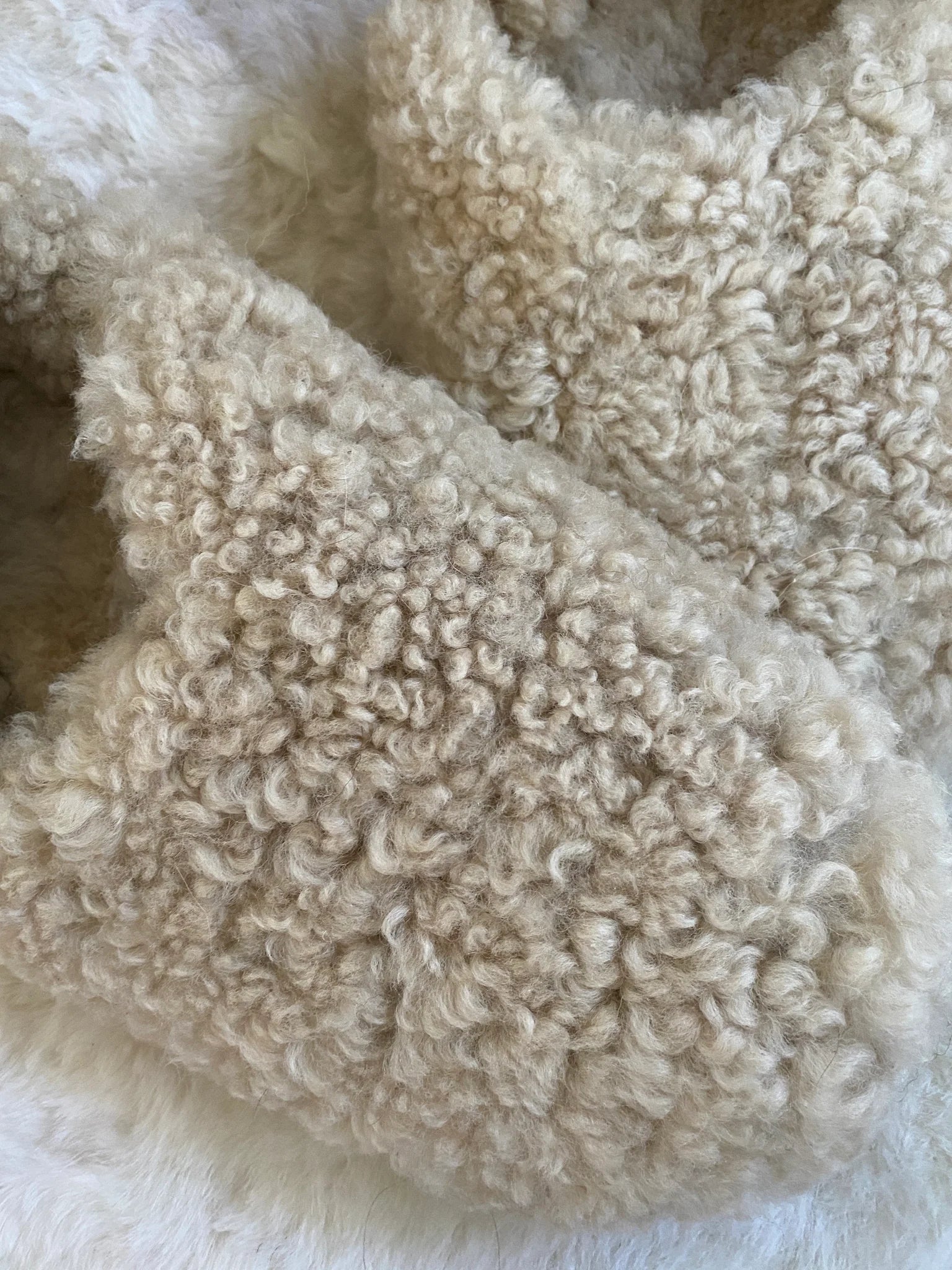 Close-up of the everyday slip on tan shearling sheepskin