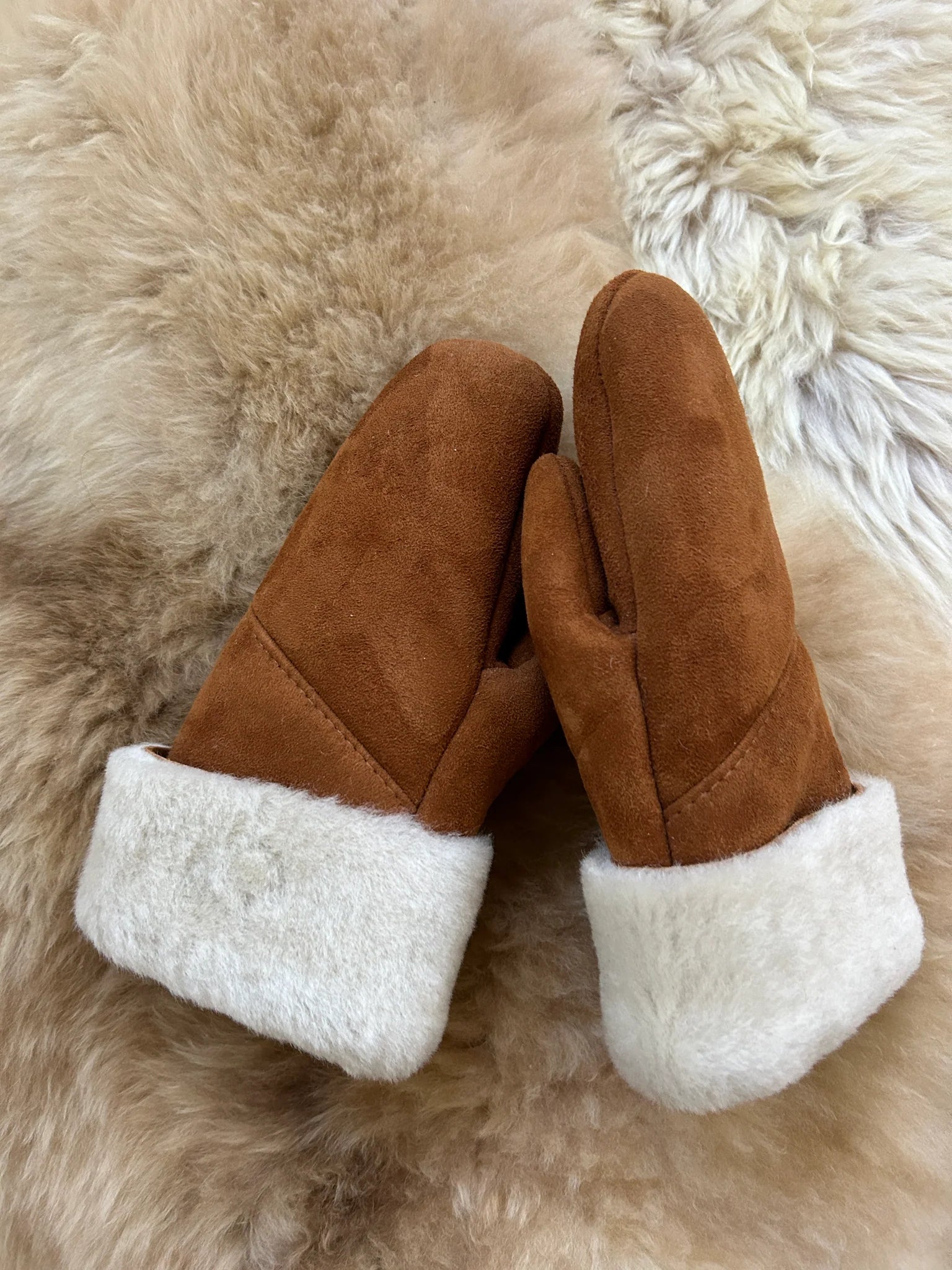 Pair of the haven sheepskin mitten in amber