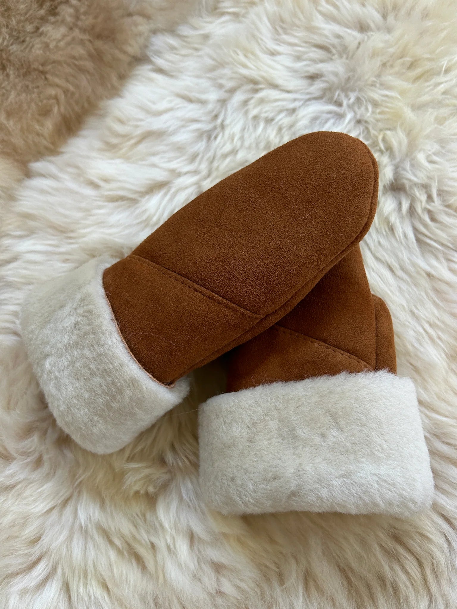 Pair of the haven sheepskin mitten in amber