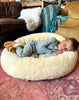 Child lying on the snugly