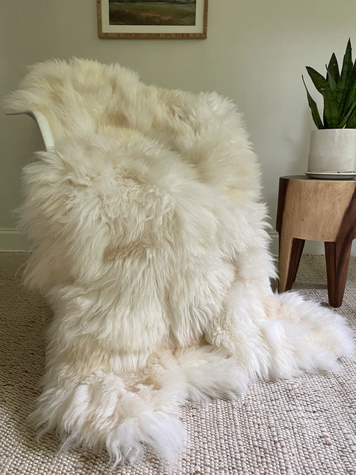 Patchwork ivory sheepskin on a chair