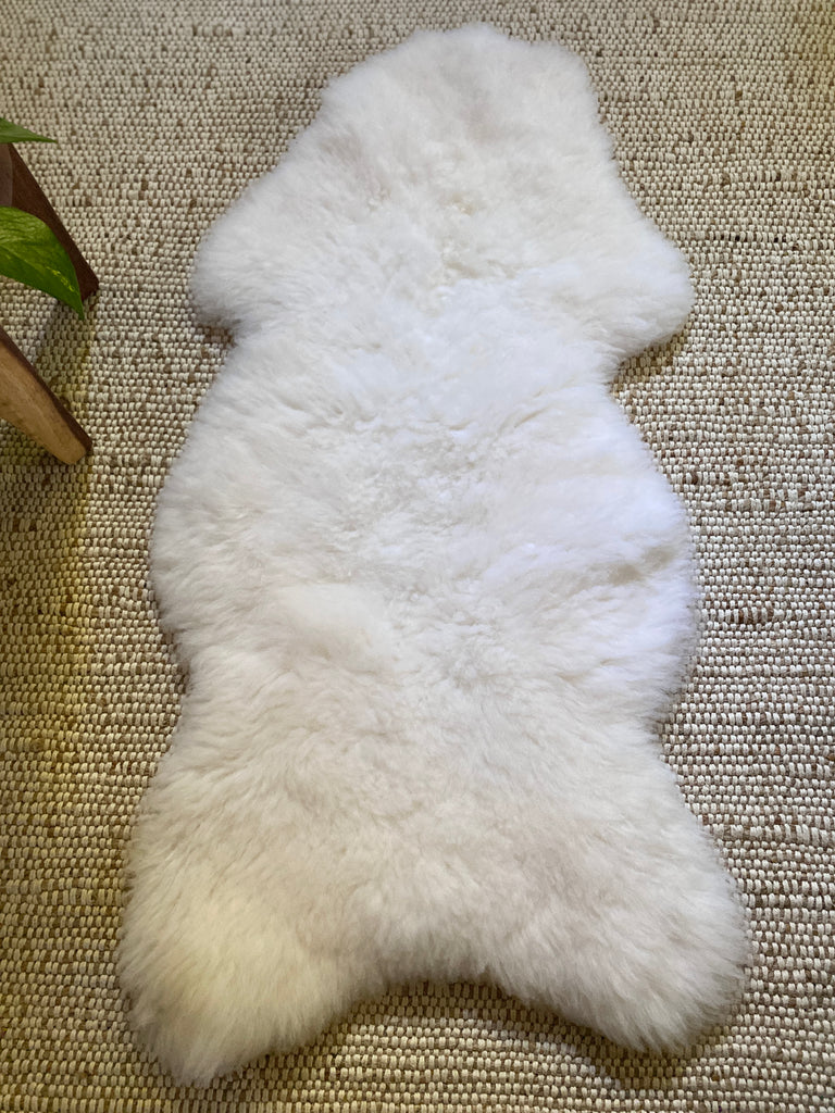 extra white sheepskin pelt