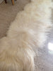 white sheepskin rug