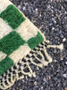checkered green rug
