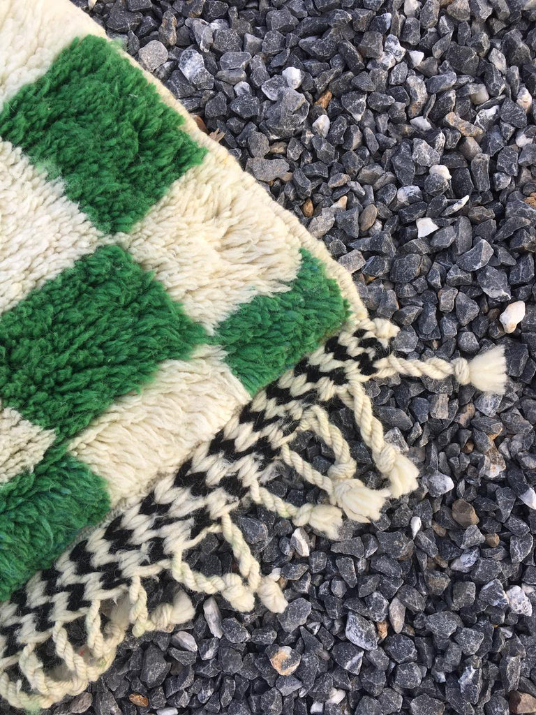 checkered green rug